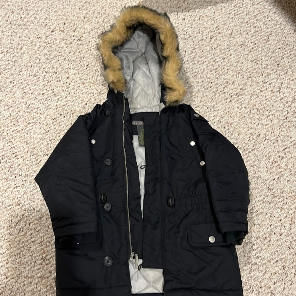 Boys Kenneth Cole Reaction black jacket with faux fur trimmed hood. Size 4